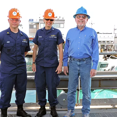 Bureau of Safety and Environmental Enforcement (BSEE) Oil Spill Response Division Chief David Moore, along with U.S. Coast Guard (USCG) Office of Marine Environmental Response Policy Chief Captain Claudia Gelzer and Lieutenant Commander Wes James, viewed a 42-foot long skimming vessel test, the first-of-its-size at Ohmsett, BSEE