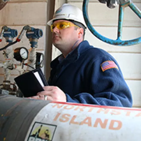 Michael Jordan records starting pressures on valves during an inspection at Northstar.